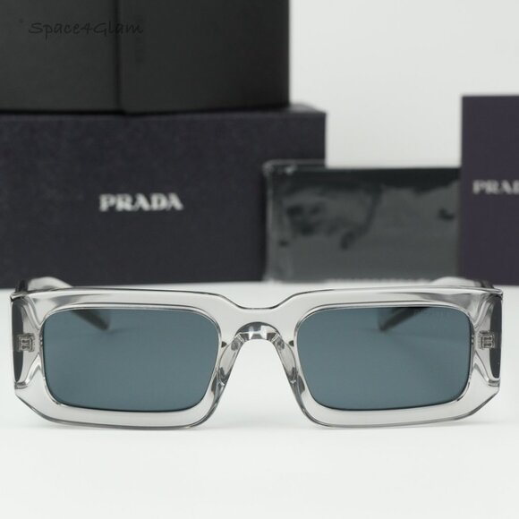 BRAND NEW Prada PR06YS 12R09T Transparent Grey Rectangle Unisex Sunglasses - Picture 1 of 10